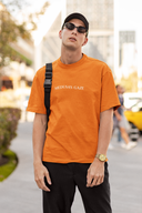 Medusa's Gaze Half Sleeve Orange Oversized T-Shirt for Men by Hello Swanky