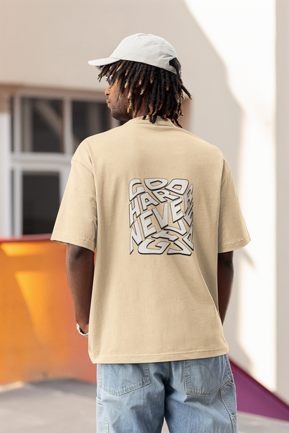 Never Give Up Unisex Beige Oversized T-Shirt – Motivational