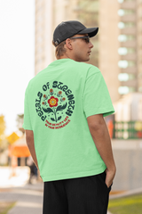 Petals of strength half sleeve saga green oversized t-shirt for men by hello