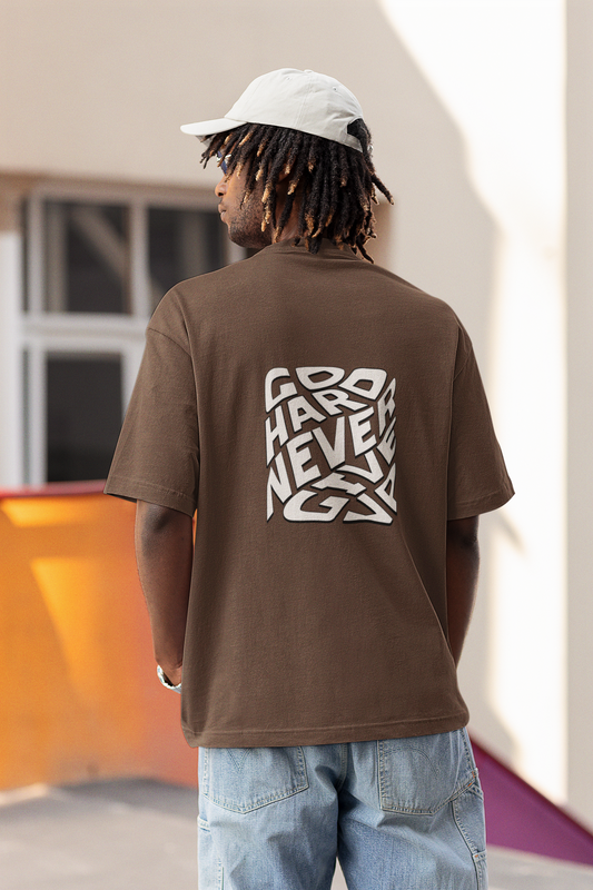 Never Give Up Unisex Brown Oversized T-Shirt – Motivational