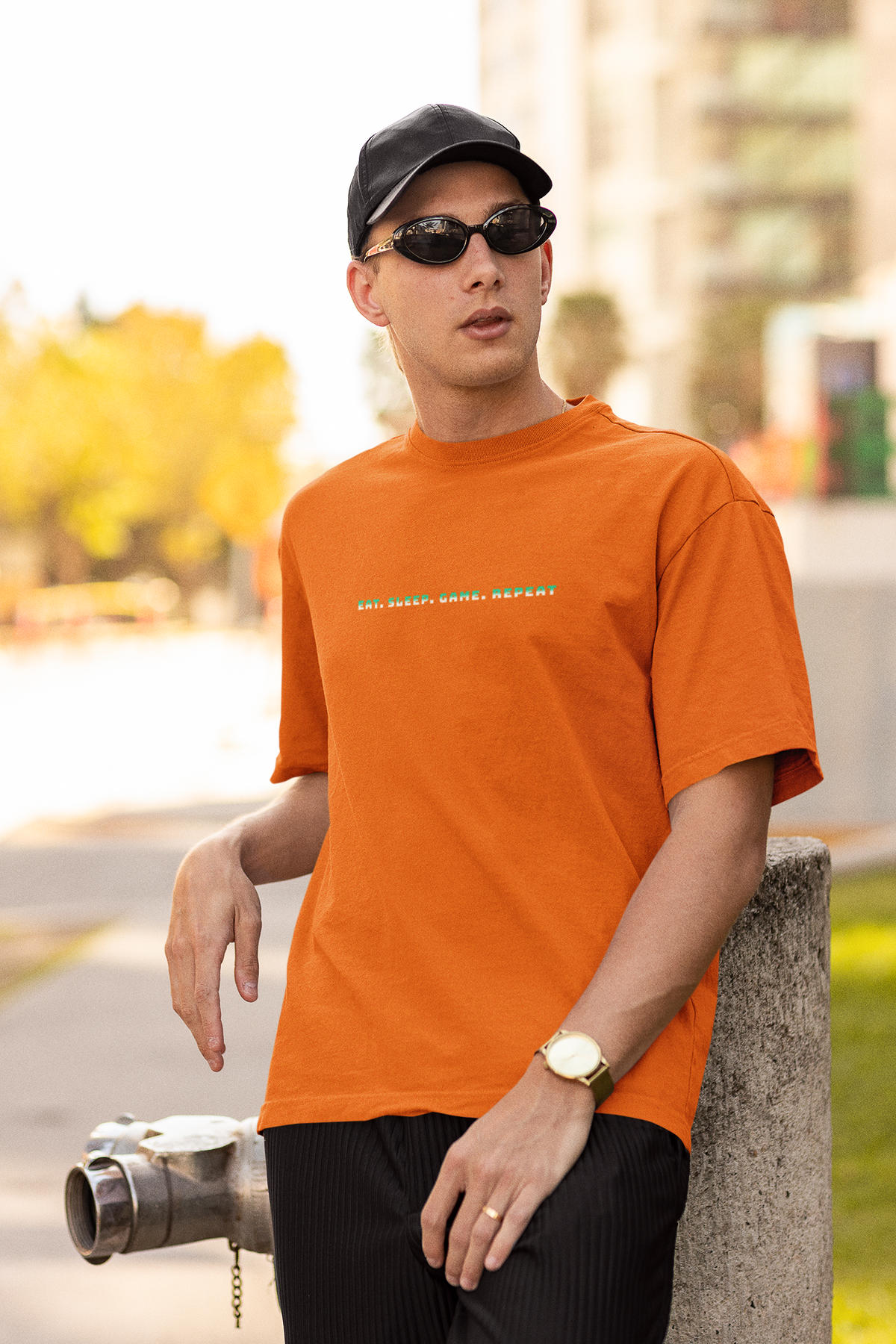 EAT, SLEEP, GAME Half Sleeve Orange Oversized T-Shirt for Men by Hello Swanky
