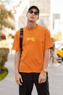 Wild & Free Half Sleeve Orange Oversized T-Shirt for Men by Hello Swanky