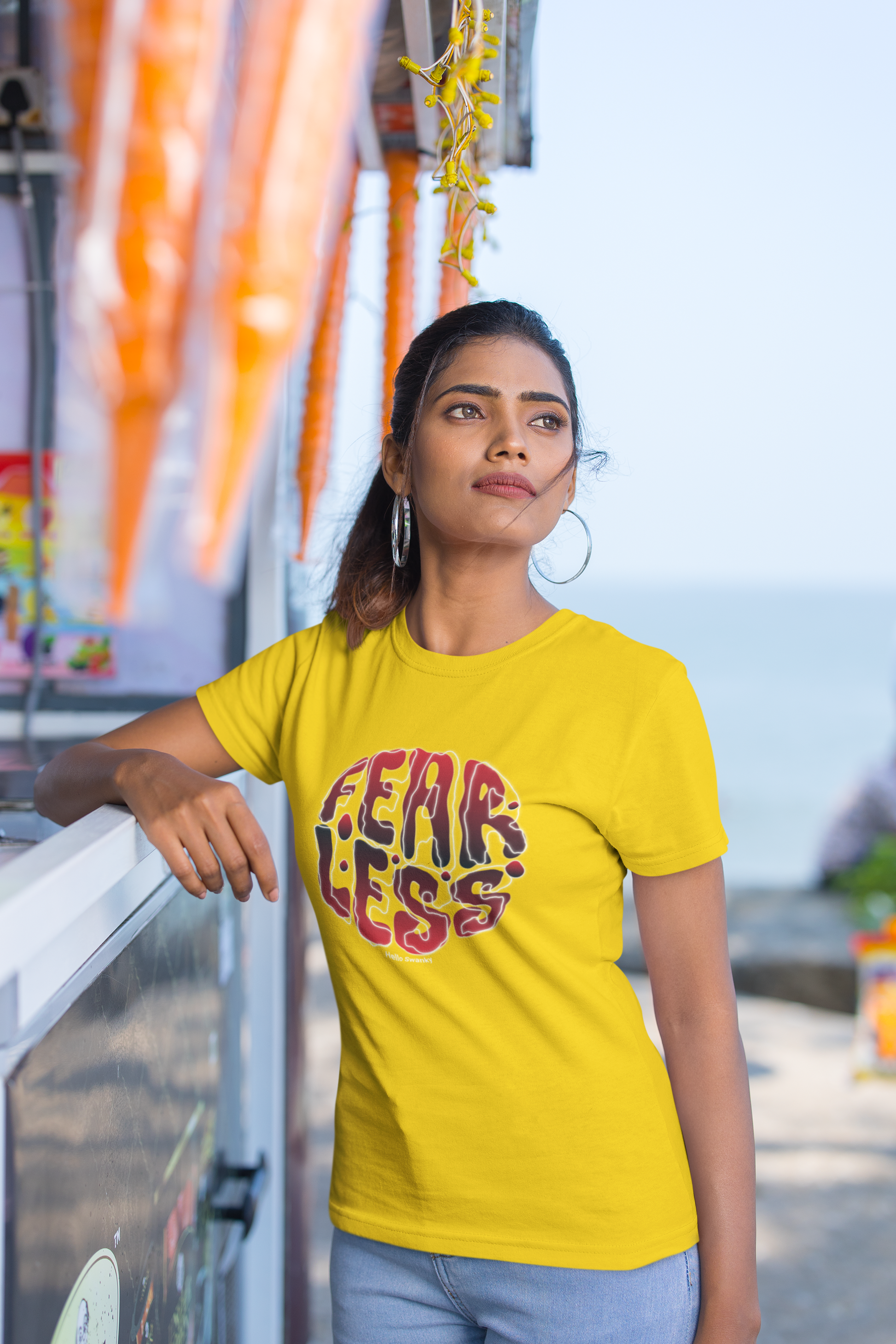 Fear less half sleeve yellow round neck t-shirt for women by hello swanky - s