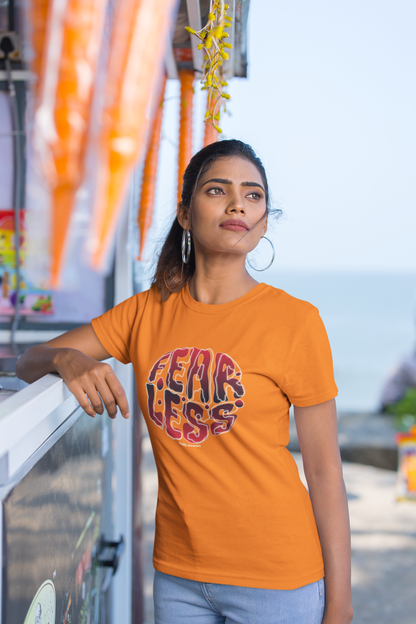 Fear less half sleeve orange round neck t-shirt for women by hello swanky - s