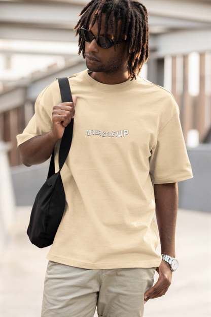 Never Give Up Unisex Beige Oversized T-Shirt – Motivational